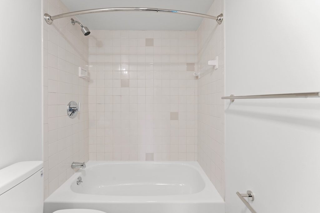 275 Main Street, Unit 404 Watertown, MA 02472 - Photo 21 of 39 a close view of a bathtub in bathroom