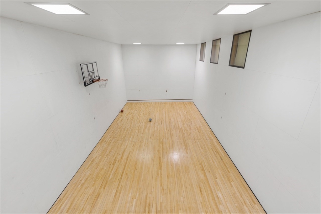 275 Main Street, Unit 404 Watertown, MA 02472 - Photo 37 of 39 a view of wooden floor in a room