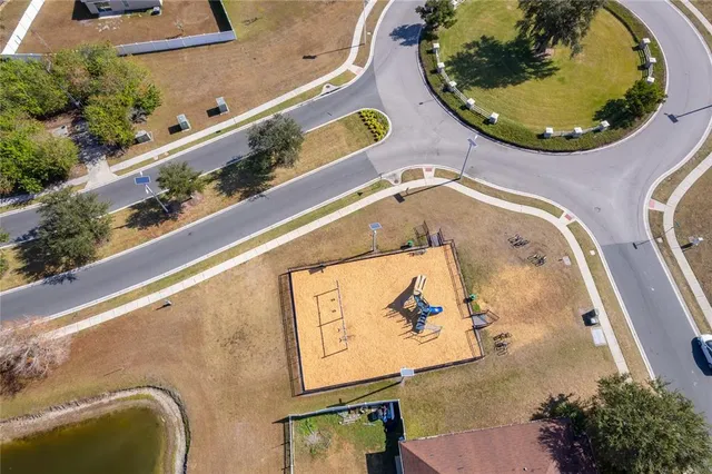 an aerial view of a highlighted house