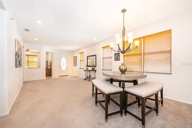 a view of a livingroom with furniture and window