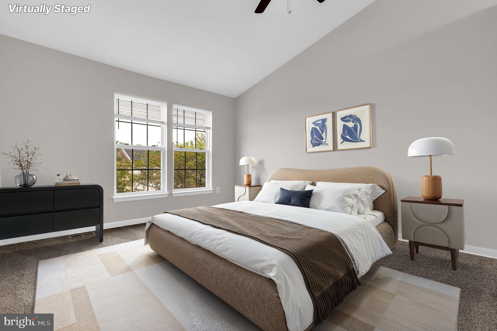 2475 Lakeside Drive Frederick, MD 21702 - Photo 13 of 40 a spacious bedroom with a bed and a window