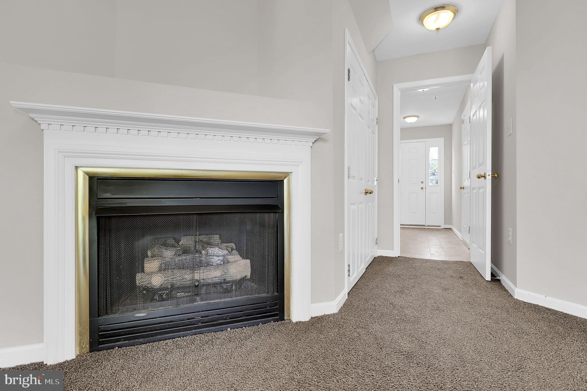 2475 Lakeside Drive Frederick, MD 21702 - Photo 22 of 40 a view of a livingroom with a fireplace