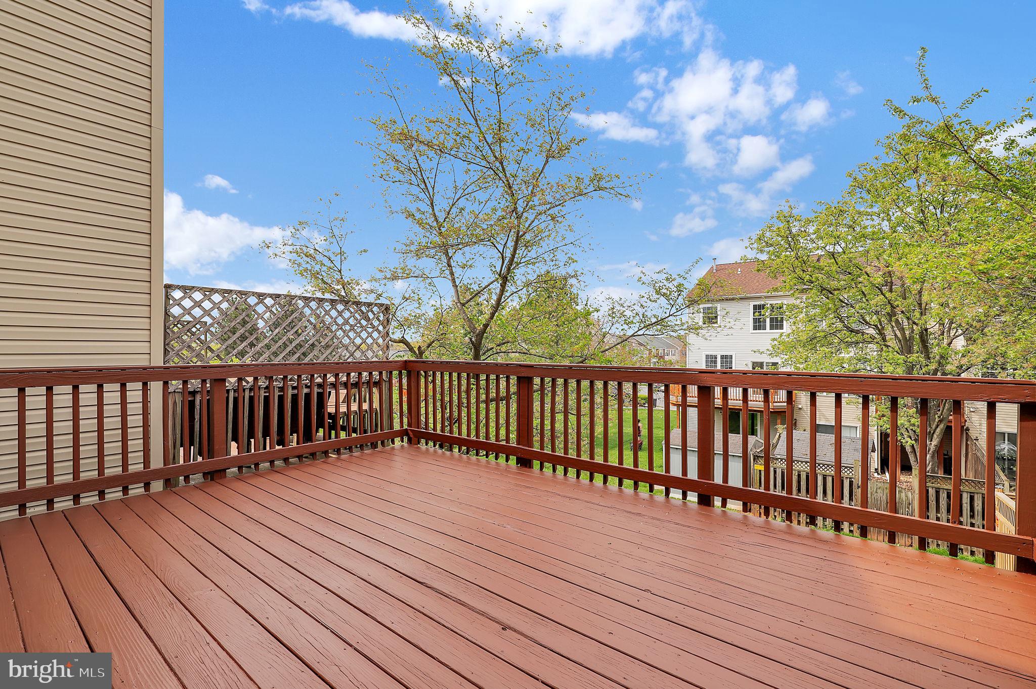 2475 Lakeside Drive Frederick, MD 21702 - Photo 25 of 40 a view of deck with wooden floor and fence