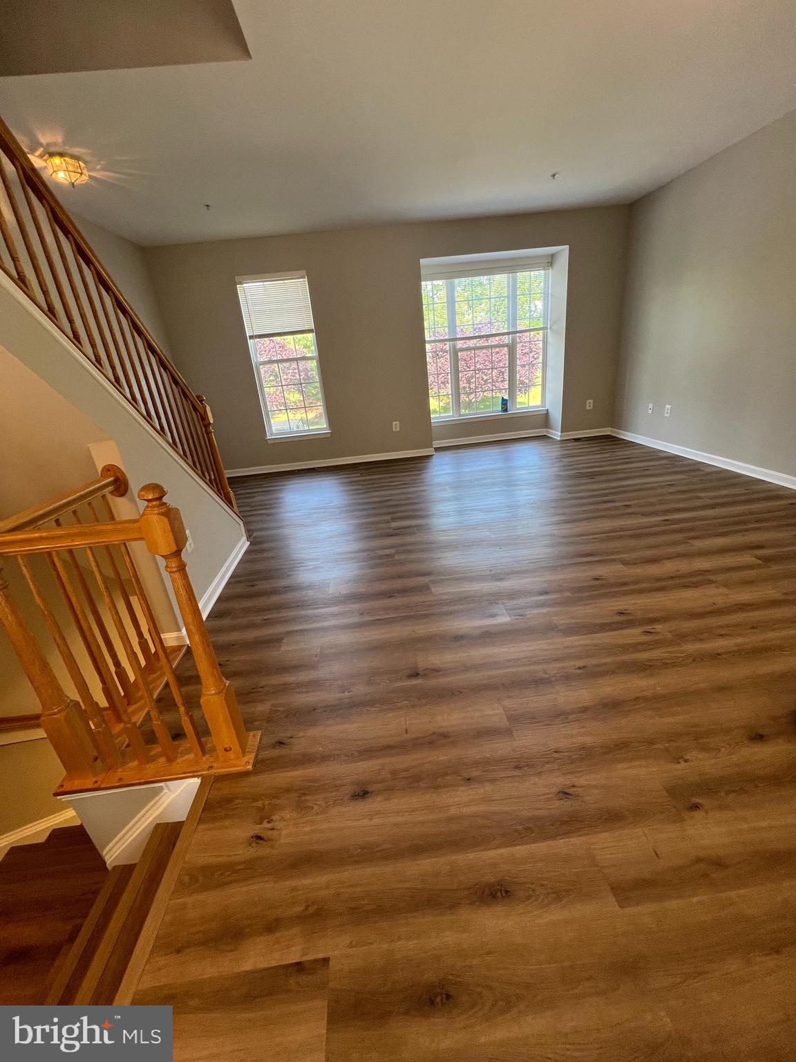 2475 Lakeside Drive Frederick, MD 21702 - Photo 28 of 40 an empty room with wooden floor and windows