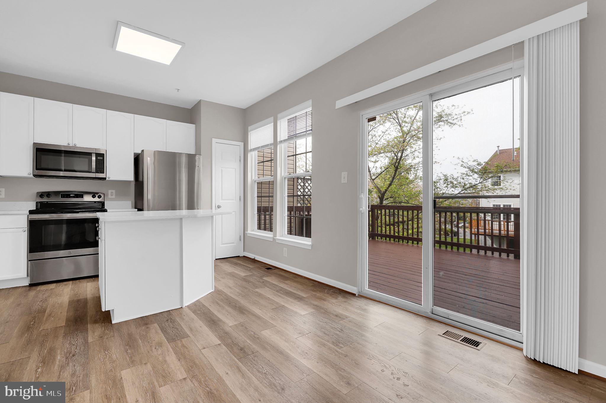 2475 Lakeside Drive Frederick, MD 21702 - Photo 3 of 40 a view of a kitchen with a stove top oven