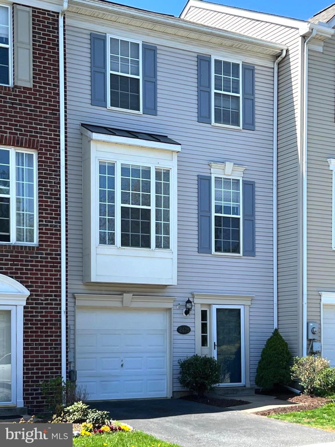 2475 Lakeside Drive Frederick, MD 21702 - Photo 40 of 40 a view of brick building with a window and a yard