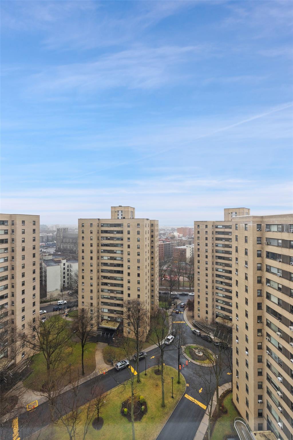 a view of a city with tall buildings