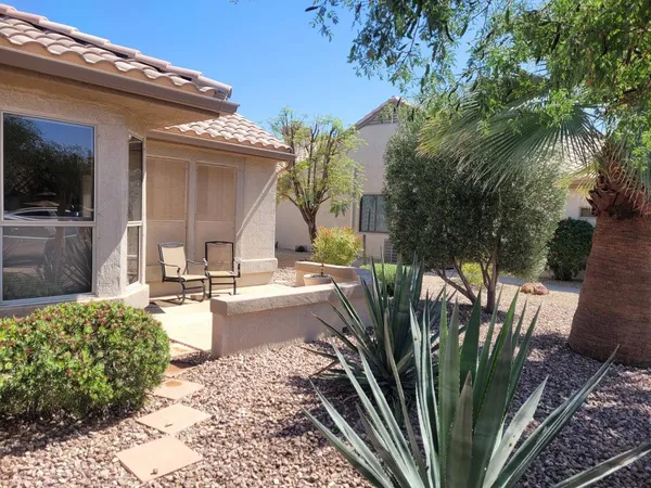 a view of a backyard with garden