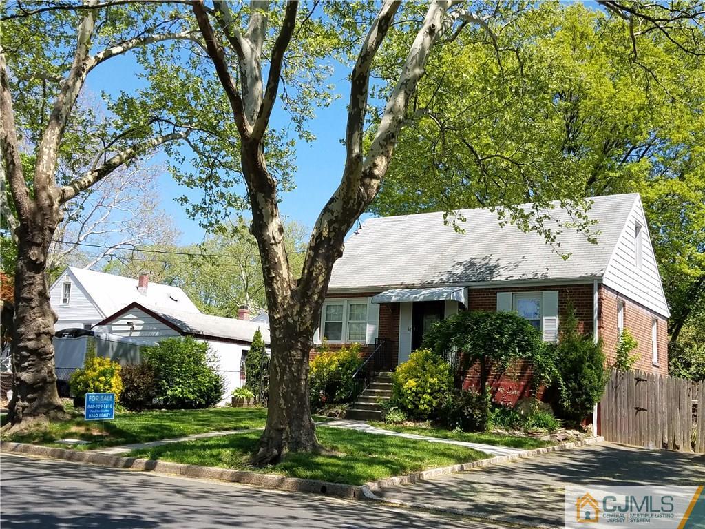68 3rd Street Edison, NJ 08837 - Photo 2 of 13 a view of a house with a tree in front of it