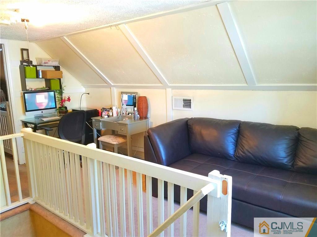 68 3rd Street Edison, NJ 08837 - Photo 11 of 13 a living room with furniture