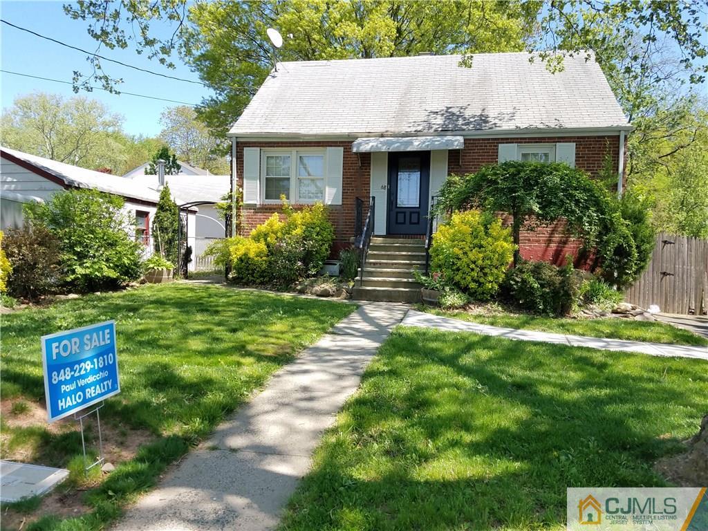 68 3rd Street Edison, NJ 08837 - Photo 3 of 13 a front view of a house with garden