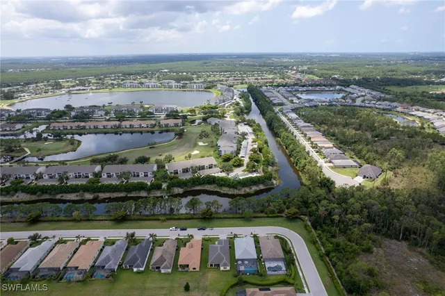 an aerial view of a house with outdoor space