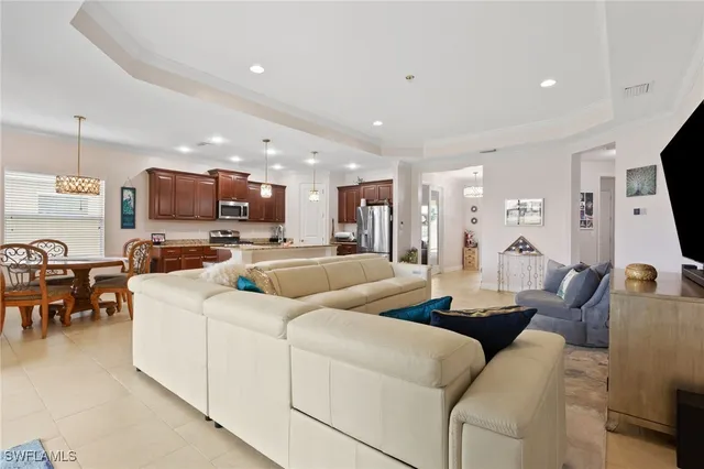 a kitchen with stainless steel appliances granite countertop a sink stove and microwave