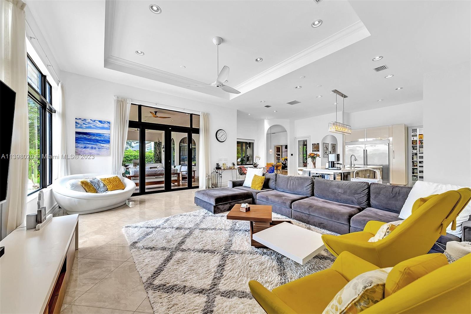 731 Ranch Road Weston, FL 33326 - Photo 13 of 53 a living room with furniture and a large window