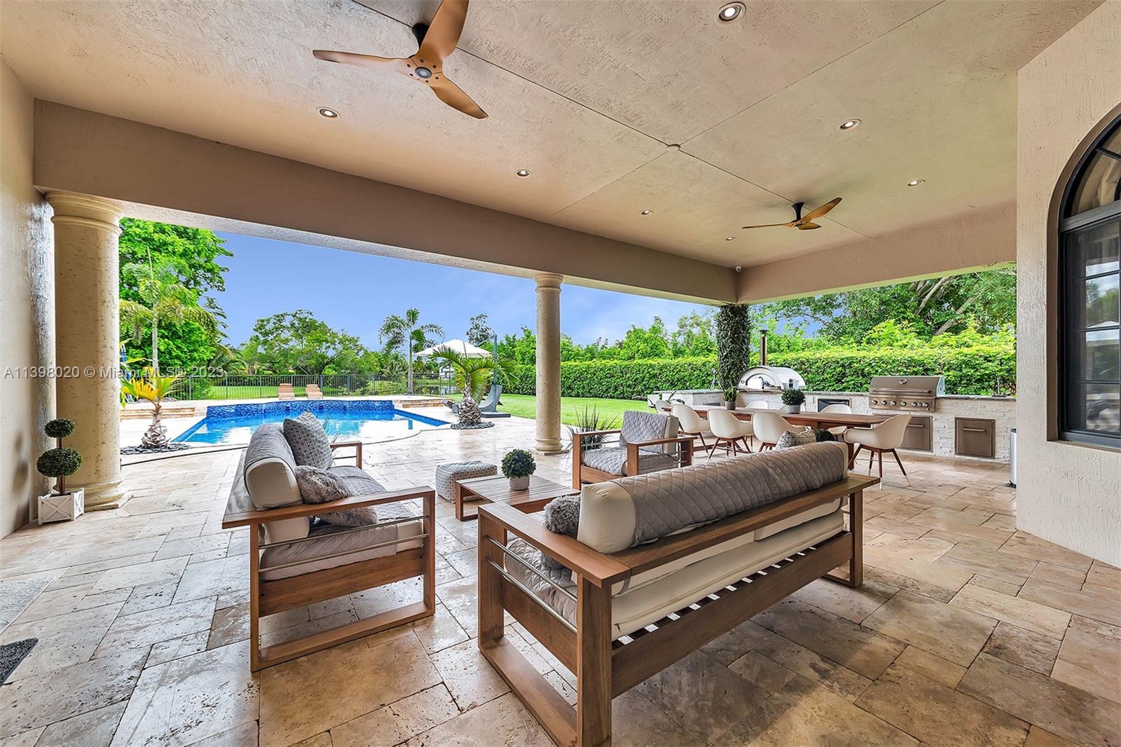 731 Ranch Road Weston, FL 33326 - Photo 23 of 53 a outdoor space with patio the couches and chairs