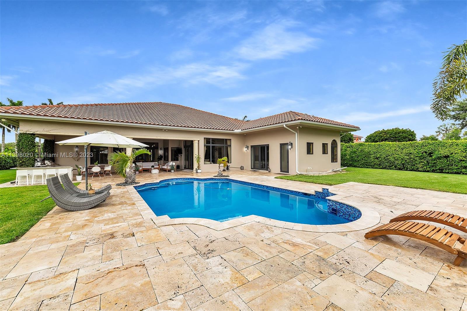 731 Ranch Road Weston, FL 33326 - Photo 31 of 53 a view of house with swimming pool and yard