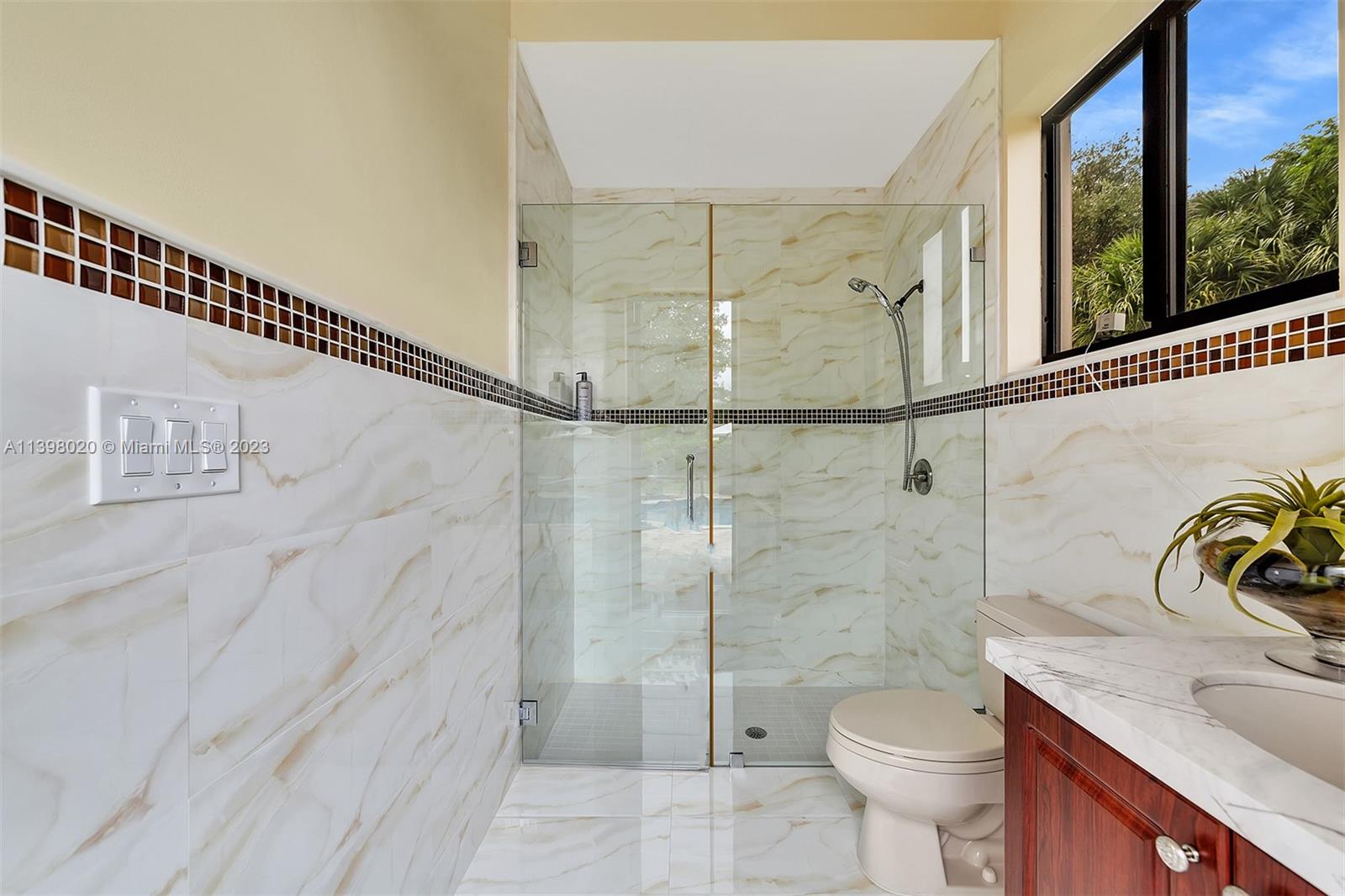 731 Ranch Road Weston, FL 33326 - Photo 33 of 53 a bathroom with a sink toilet and shower