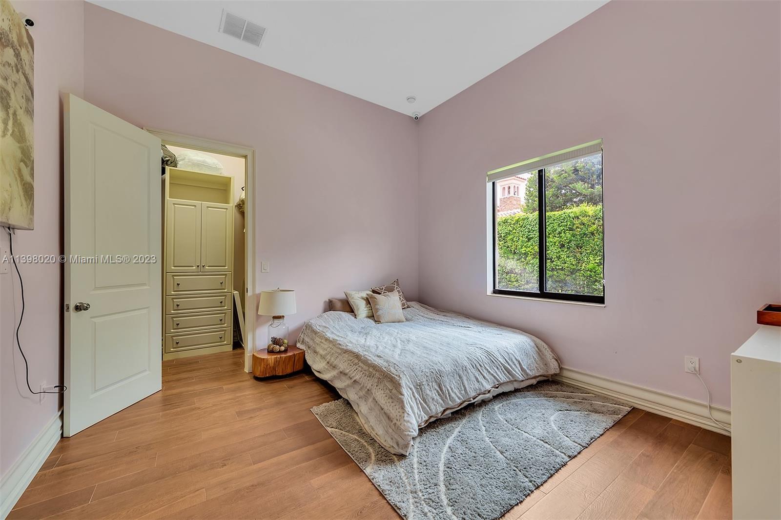 731 Ranch Road Weston, FL 33326 - Photo 41 of 53 a bedroom with a bed and a window