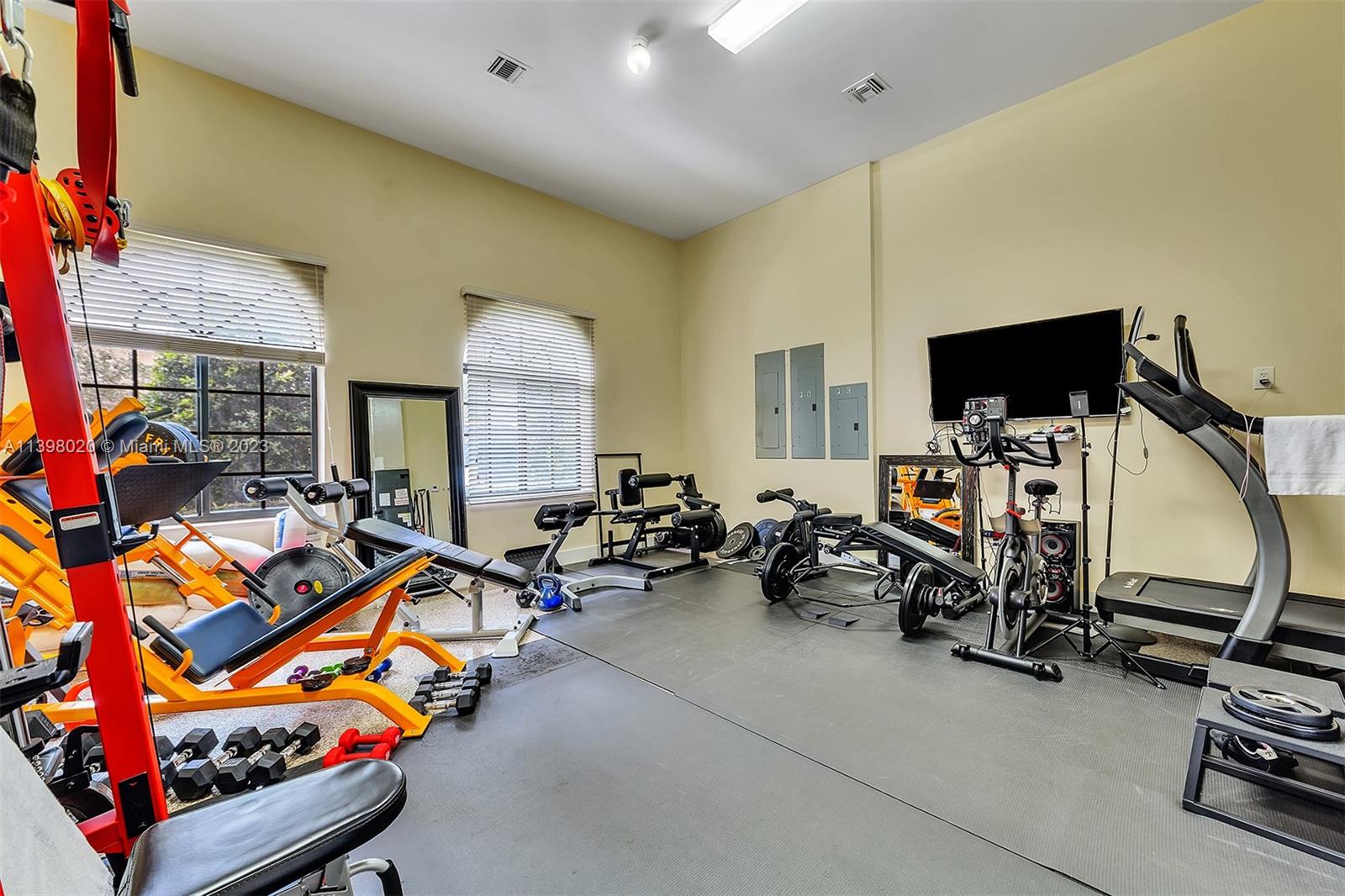 731 Ranch Road Weston, FL 33326 - Photo 47 of 53 a view of a room with gym equipment