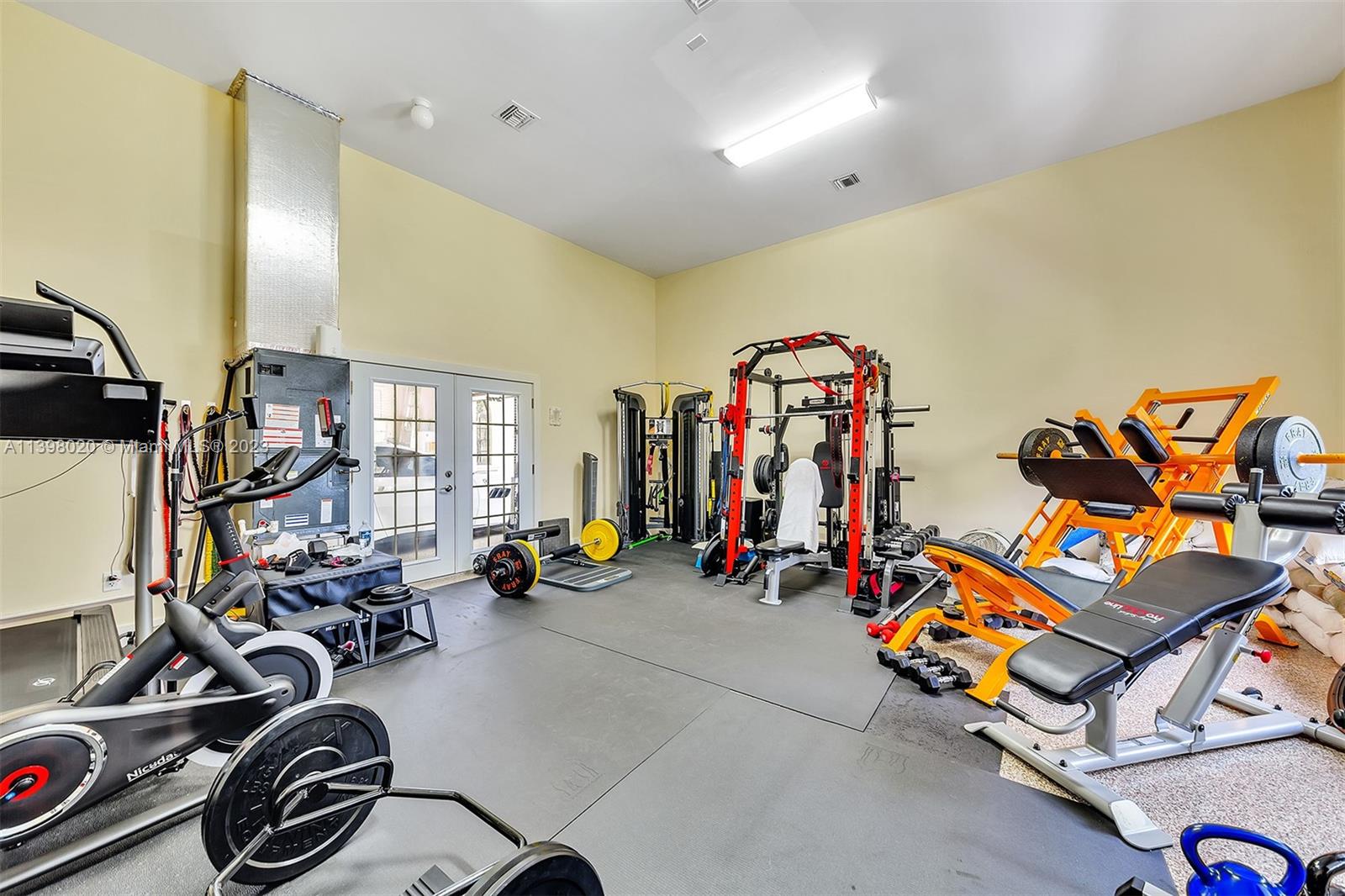 731 Ranch Road Weston, FL 33326 - Photo 48 of 53 a view of a room with gym equipment