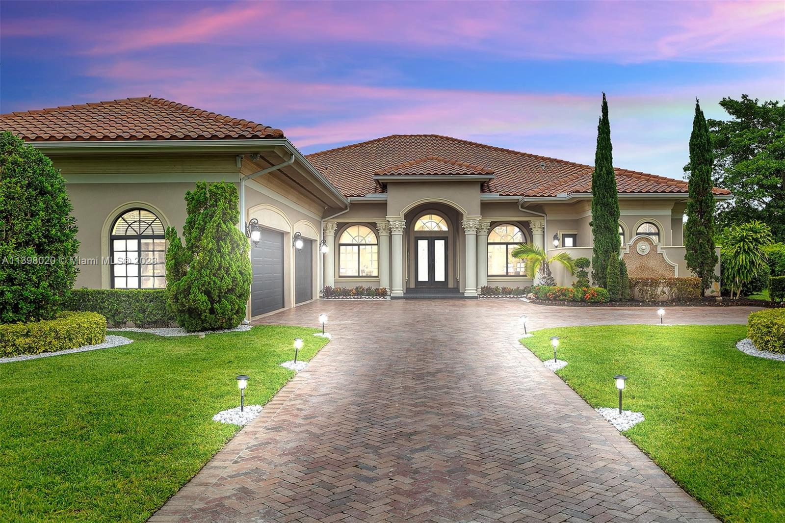 731 Ranch Road Weston, FL 33326 - Photo 52 of 53 a view of a house with garden