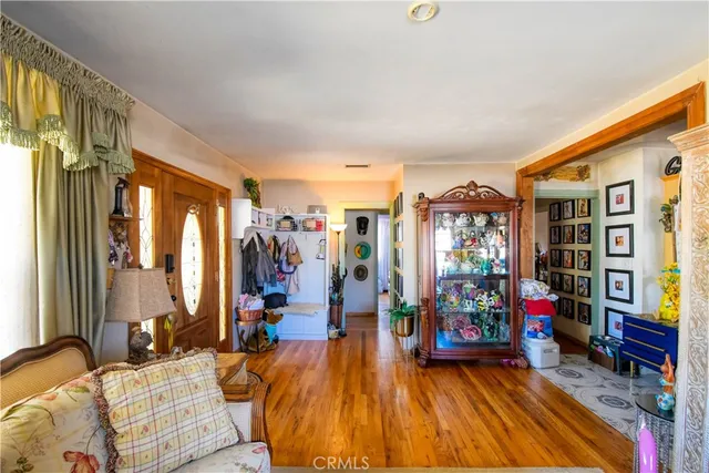 a living room with lots of furniture and gym equipment