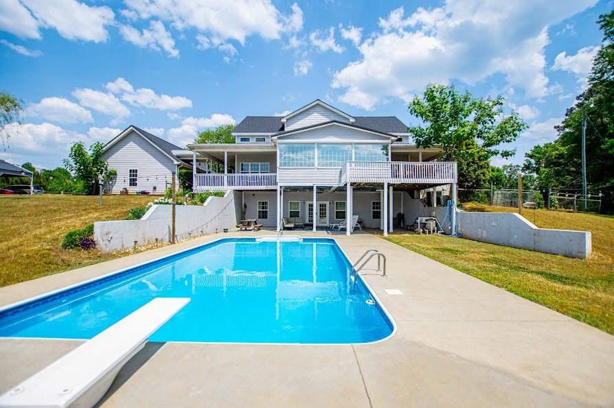 575 Liberty Church Road Carrollton, GA 30116 - Photo 78 of 95 a view of a house with swimming pool and sitting area
