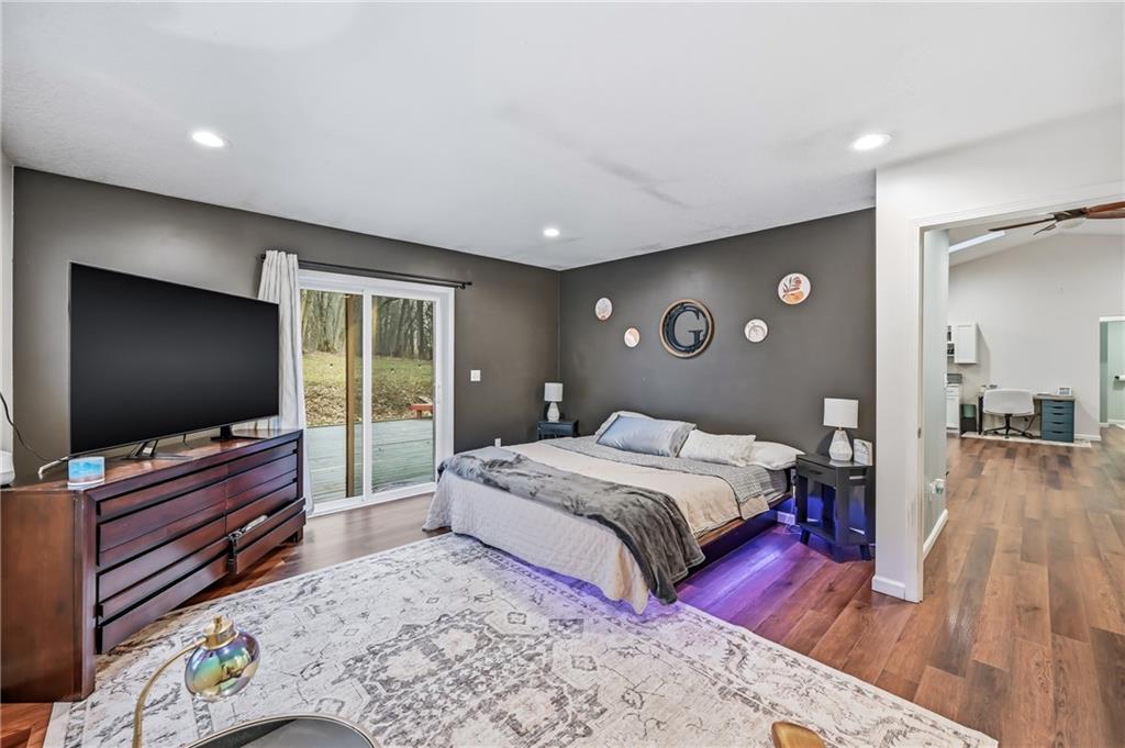 112 Willadell Road Transfer, PA 16154 - Photo 19 of 43 a bedroom with a bed and a flat screen tv