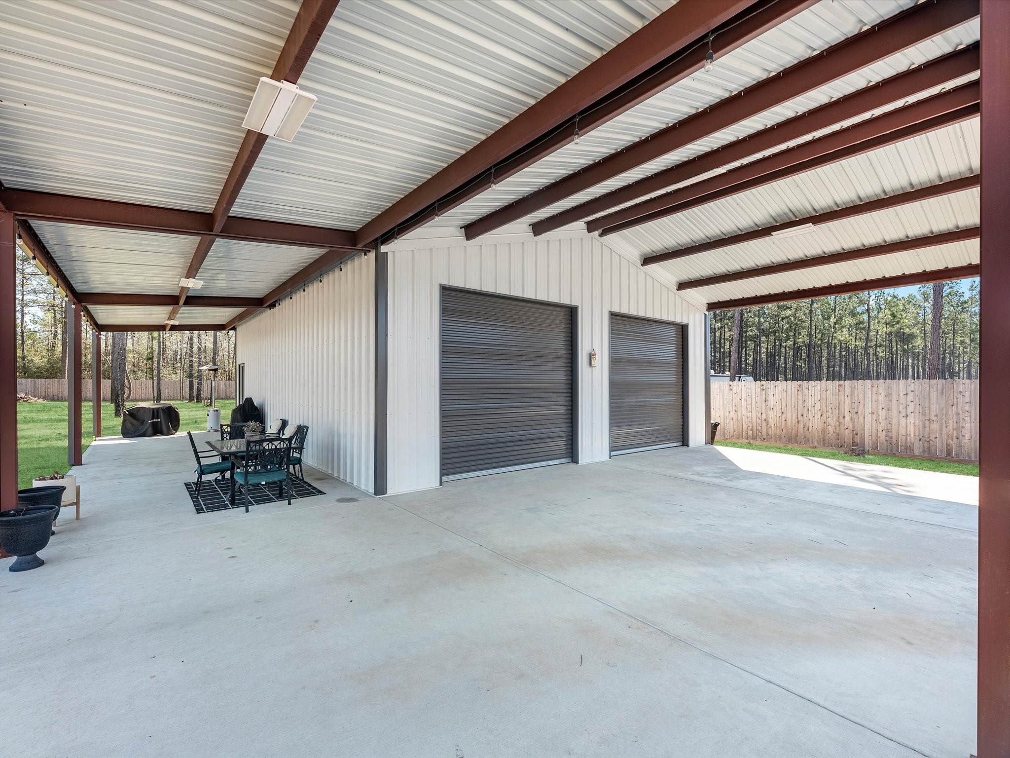 9746 Guadalupe Street Conroe, TX 77303 - Photo 35 of 42 Front and side awnings w/ extensive flat work