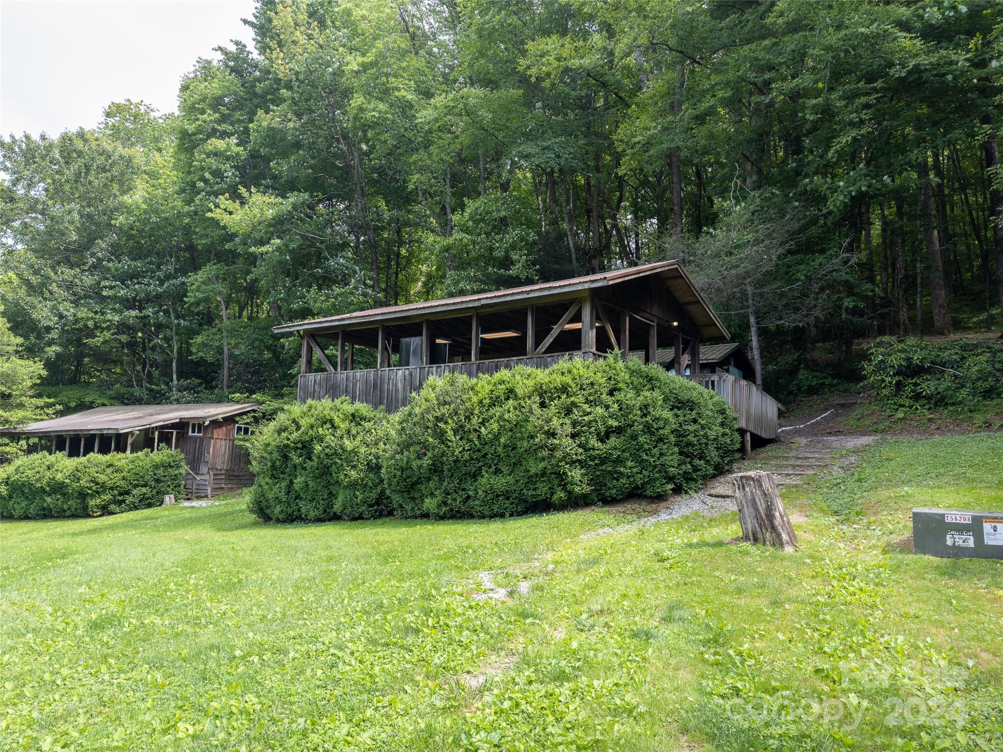 500 Winding Gap Road Lake Toxaway, NC 28747 - Photo 13 of 14 a view of a house with backyard and sitting area
