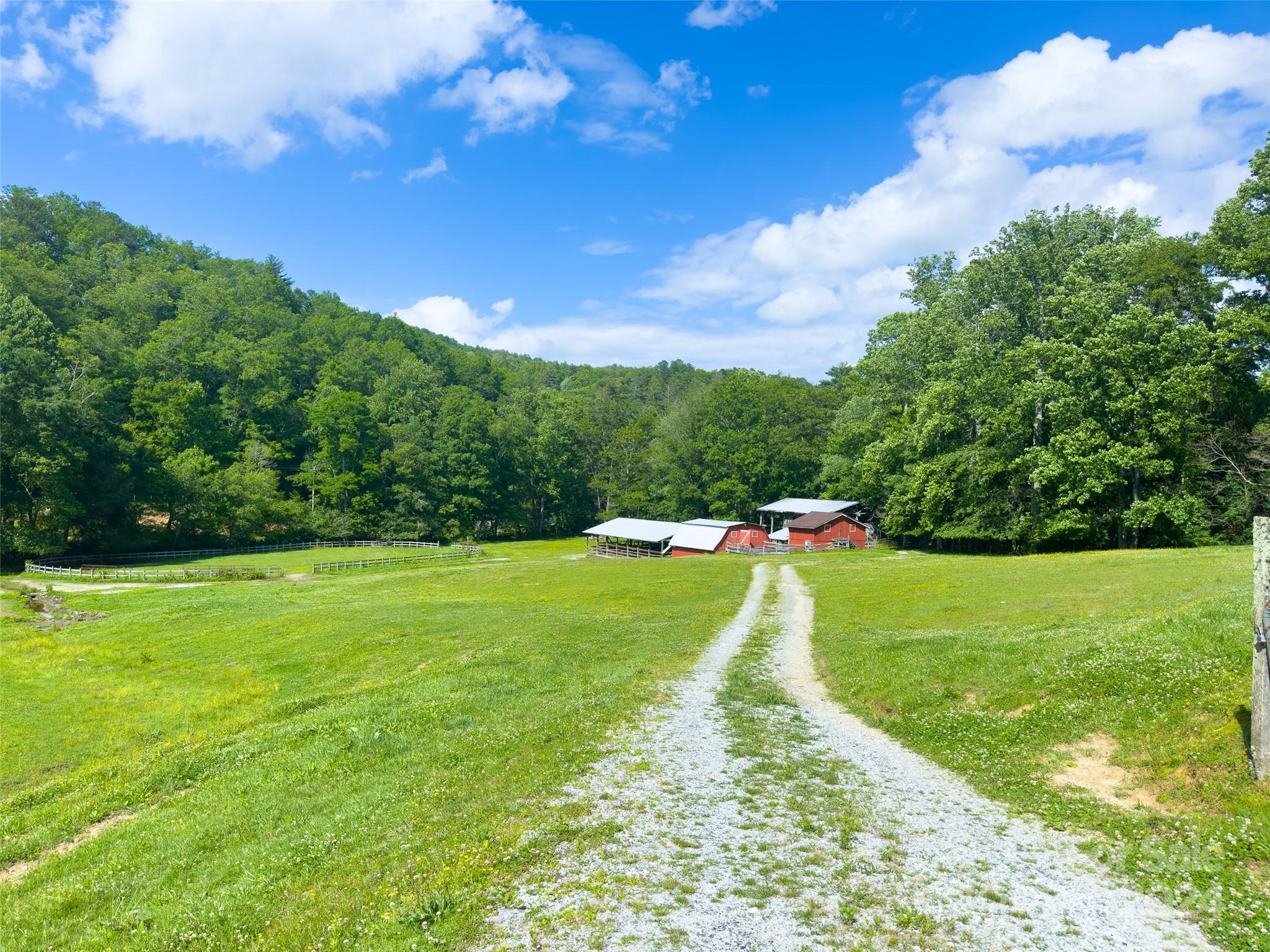 500 Winding Gap Road Lake Toxaway, NC 28747 - Photo 8 of 14 a view of a golf course with a lake