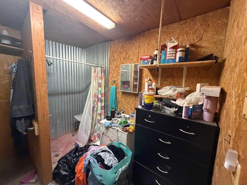 9300 Johns Road Alvarado, TX 76009 - Photo 39 of 40 a room with storage and utility
