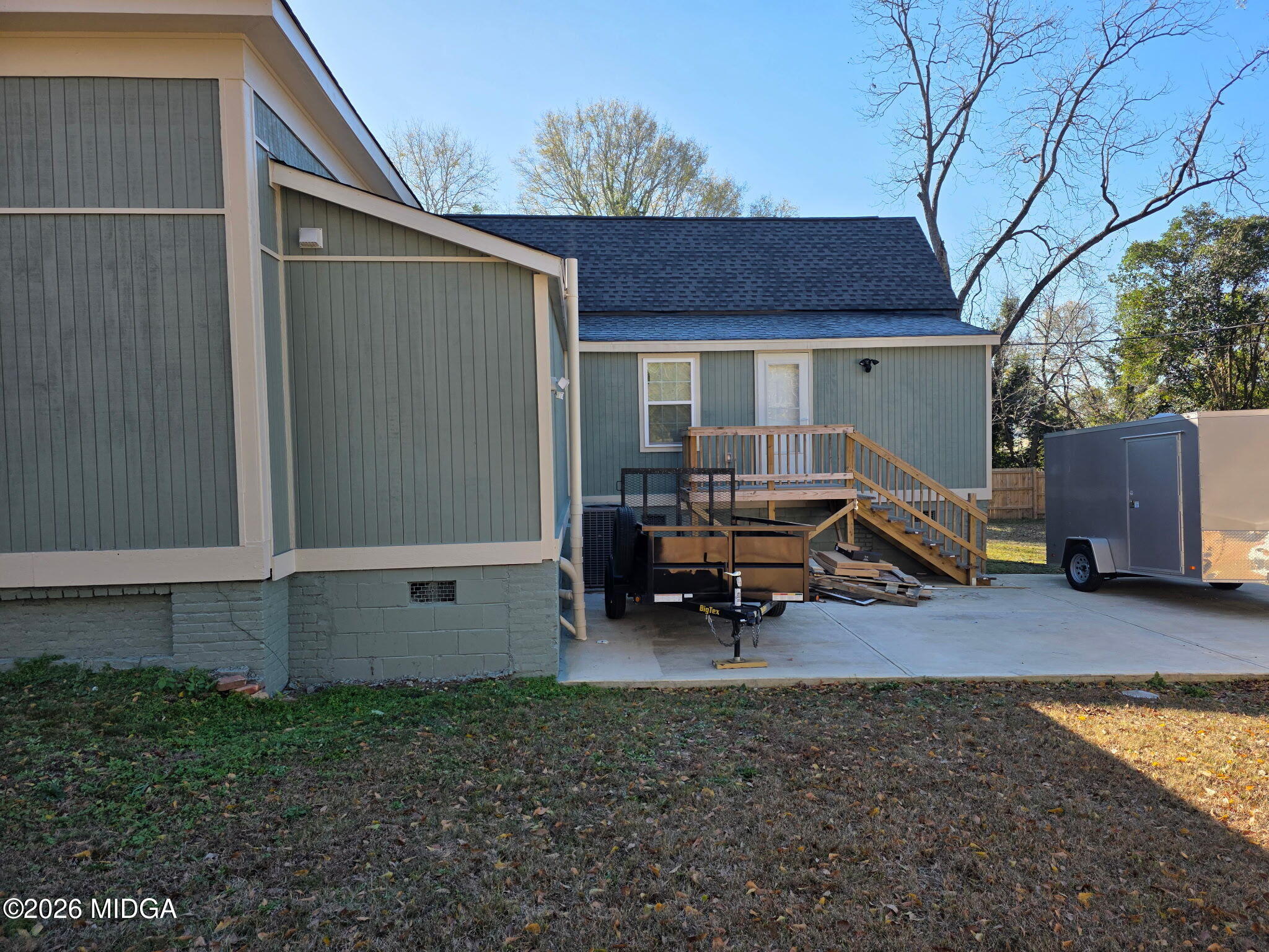 692 Center Street Macon, GA 31217 - Photo 11 of 16 a view of a house with backyard and sitting area