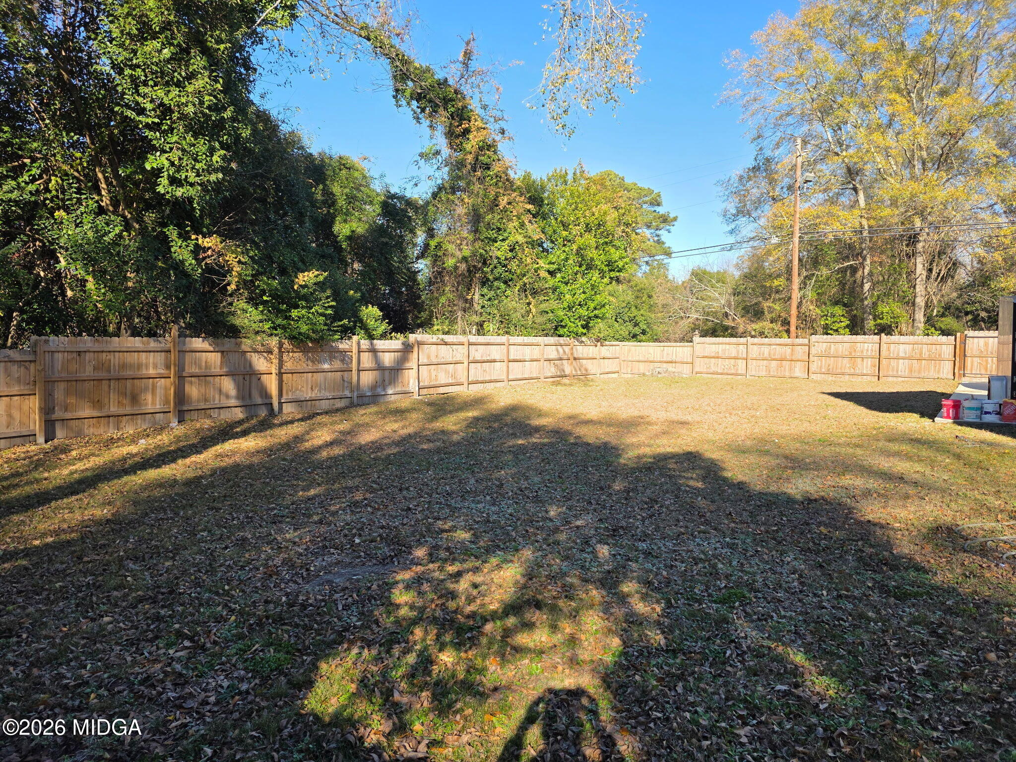 692 Center Street Macon, GA 31217 - Photo 14 of 16 a view of a yard with trees