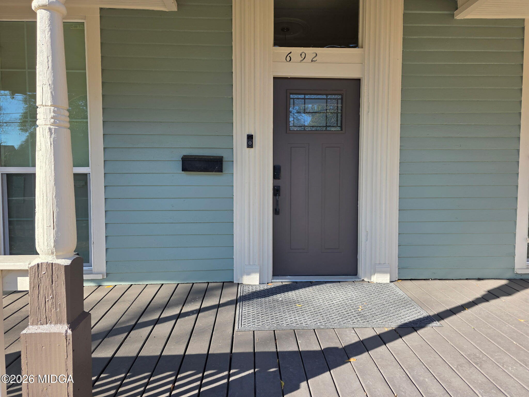 692 Center Street Macon, GA 31217 - Photo 2 of 16 a view of a wooden door of the house