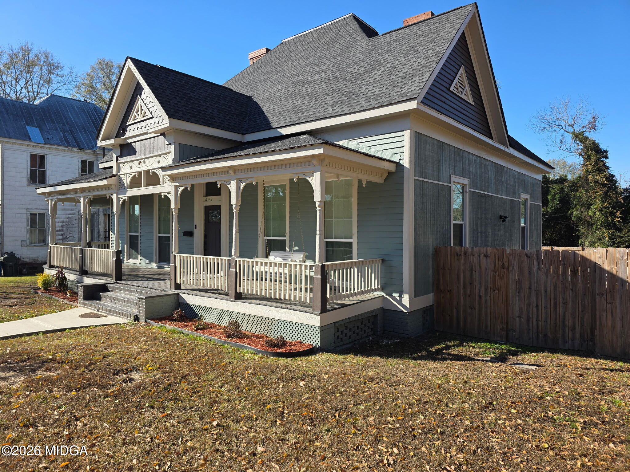 692 Center Street Macon, GA 31217 - Photo 7 of 16 a view of a house with backyard and sitting area