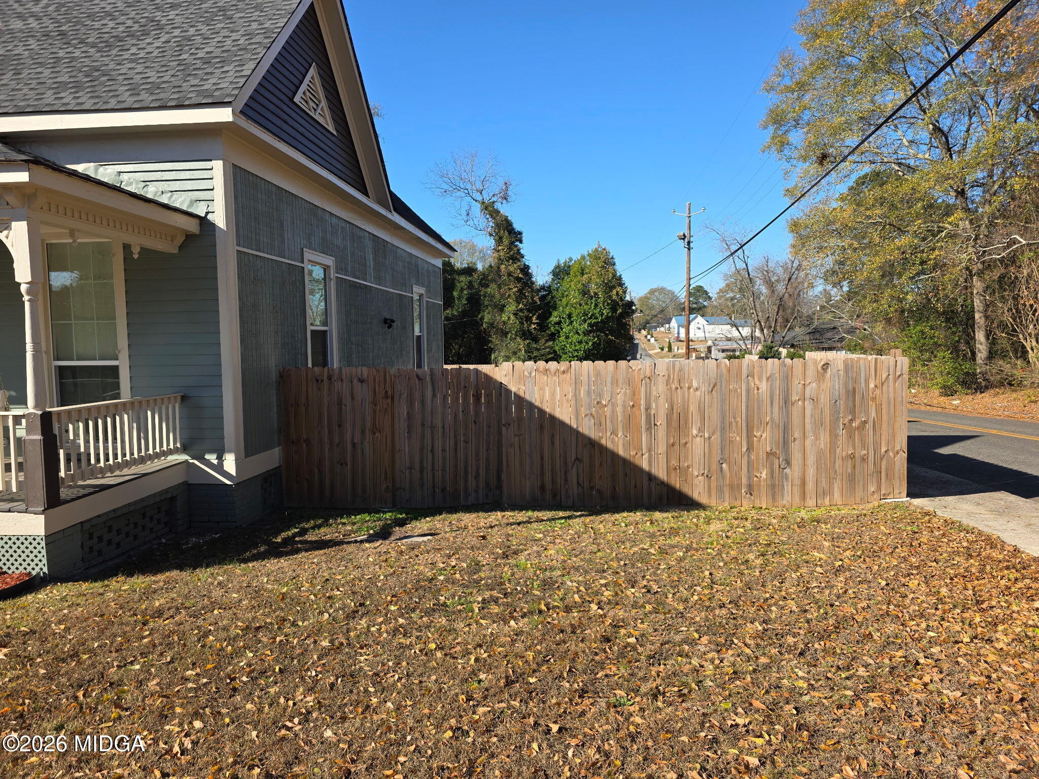692 Center Street Macon, GA 31217 - Photo 9 of 16 a view of a house with a wooden fence