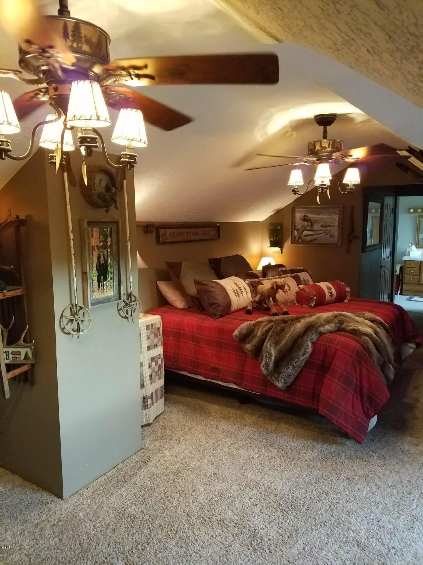 2970 Northeast East Devils Lake Road Otis, OR 97368 - Photo 7 of 12 Master suite