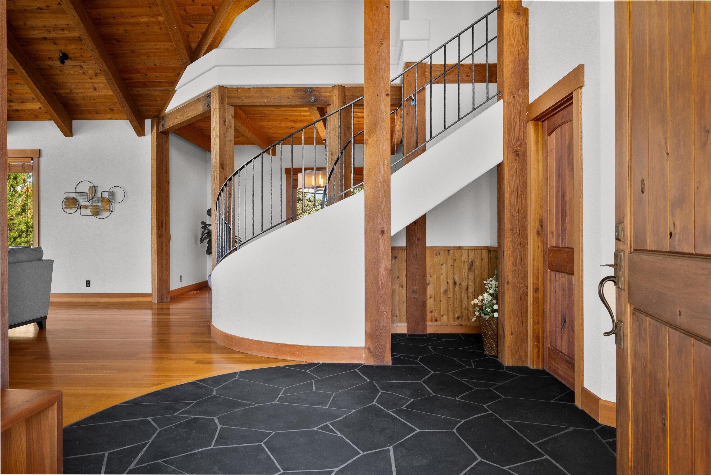 64155 Hunnell Road Bend, OR 97703 - Photo 7 of 96 Step in to this inviting home with gracious entry.