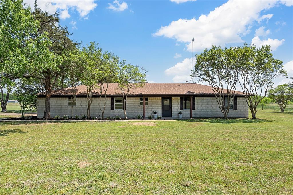 2988 East Old Axtell Road Axtell, TX 76624 - Photo 33 of 38 a view of a house with a yard