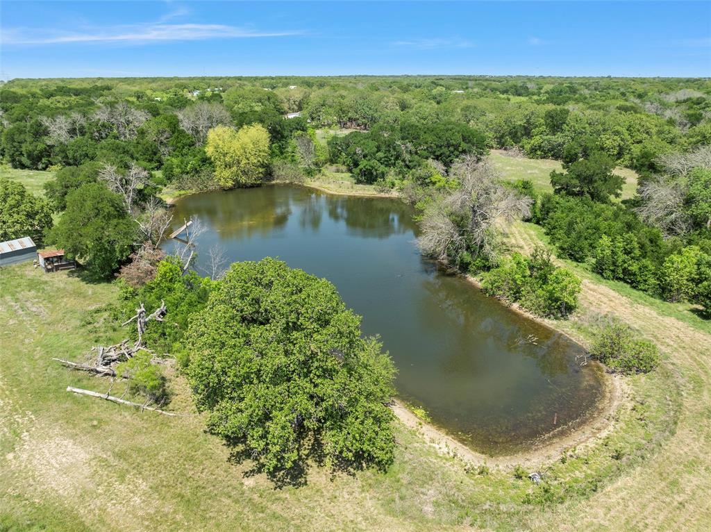2988 East Old Axtell Road Axtell, TX 76624 - Photo 34 of 38 a view of a lake from a yard