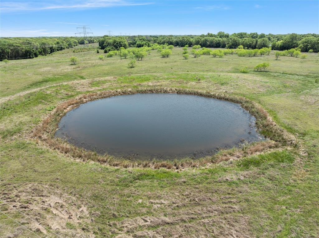2988 East Old Axtell Road Axtell, TX 76624 - Photo 36 of 38 a view of a lake with a mountain