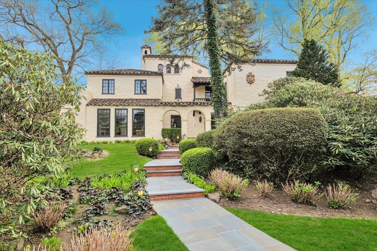 301 Overlook Road New Rochelle, NY 10804 - Photo 1 of 1 a front view of a house with a garden