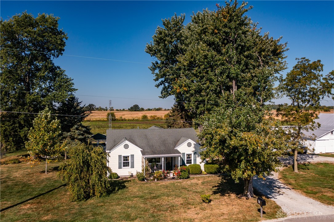 1599 Garringer Road Jamestown, OH 45335 - Photo 71 of 73 This charming home features a lovely exterior with inviting architectural details, nestled in a vibrant natural setting.
