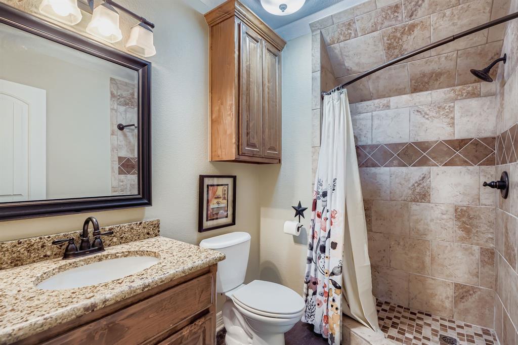 785 Schneider Road Howe, TX 75459 - Photo 16 of 40 Bathroom in bonus room h featuring vanity and a shower stall