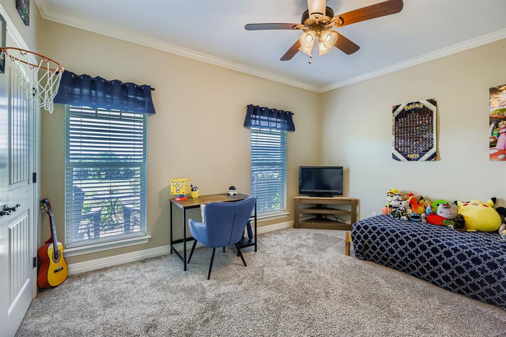 785 Schneider Road Howe, TX 75459 - Photo 27 of 40 Bedroom with carpet floors, ornamental molding, and a ceiling fan