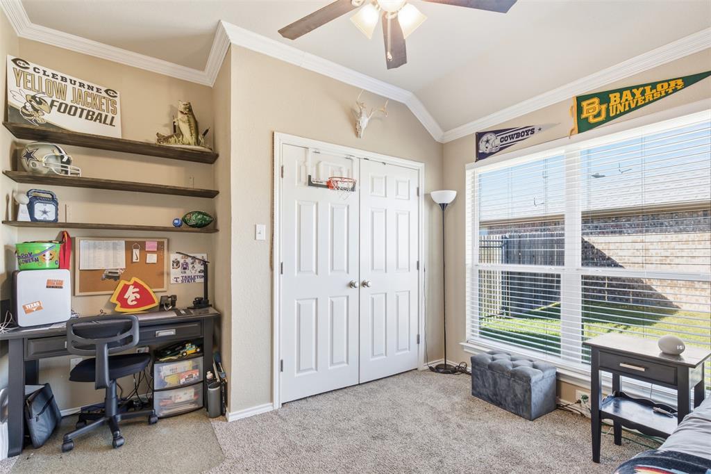 814 Chestnut Grove Drive Cleburne, TX 76033 - Photo 25 of 40 a room with furniture and a window