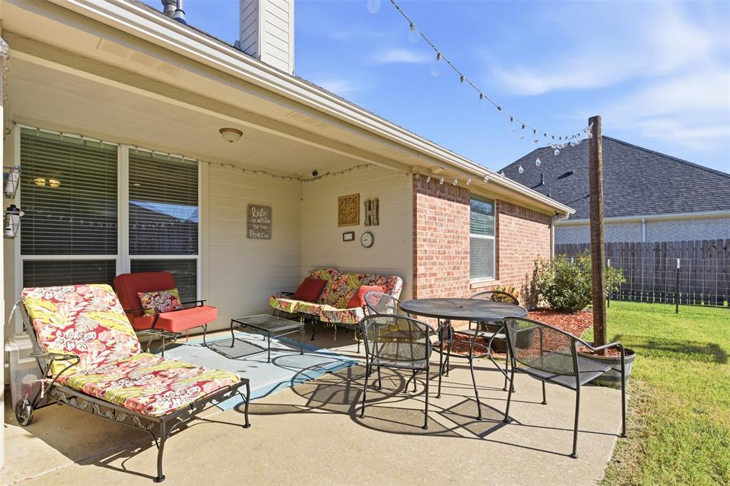 814 Chestnut Grove Drive Cleburne, TX 76033 - Photo 33 of 40 a outdoor space with patio the couches and a potted plant on the table