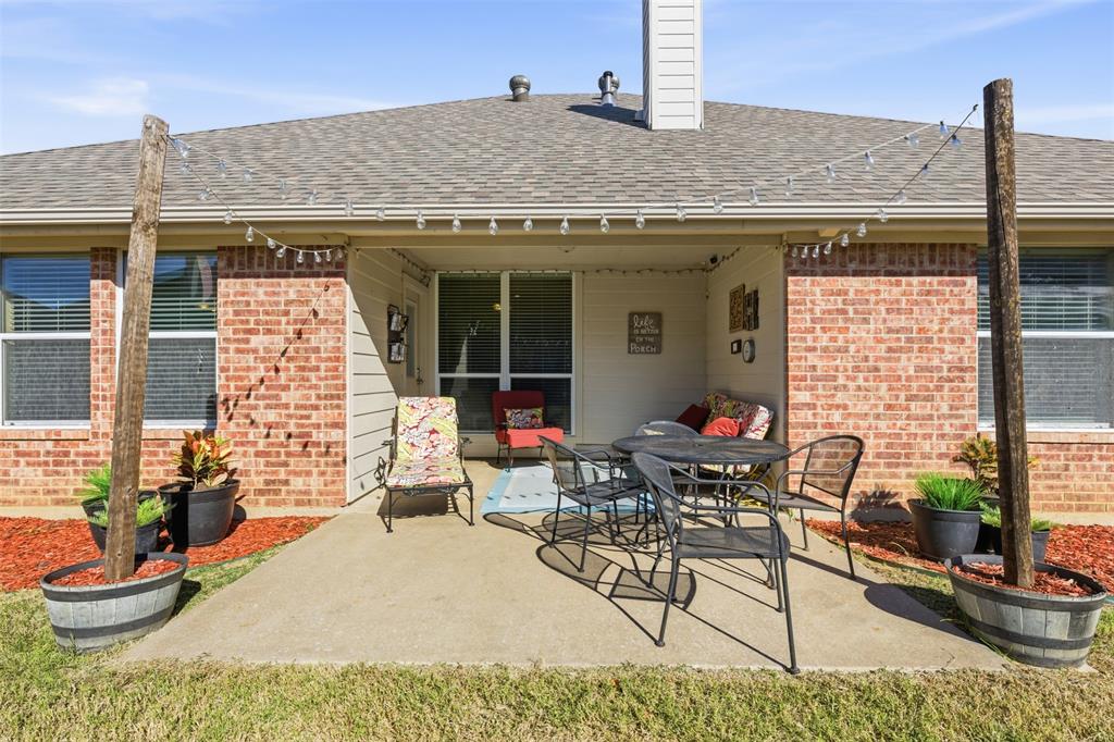 814 Chestnut Grove Drive Cleburne, TX 76033 - Photo 34 of 40 a building outdoor space with patio furniture