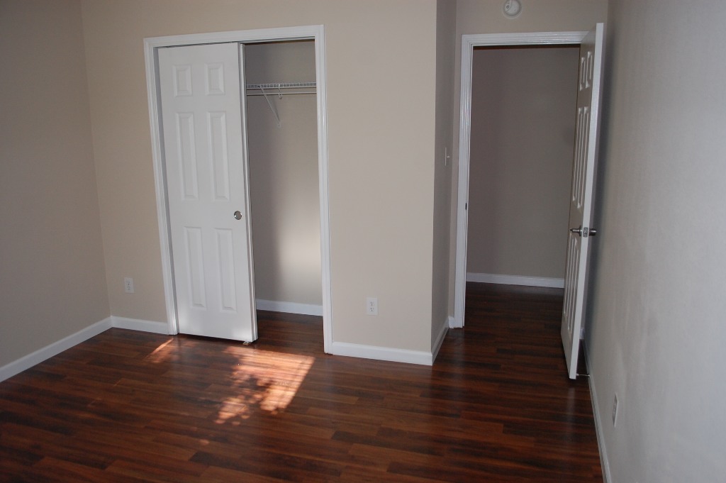 11300 Dimmit Street Manor, TX 78653 - Photo 19 of 23 Rich hardwood-style flooring extends through this naturally lit, inviting room, ready for your personal touch.